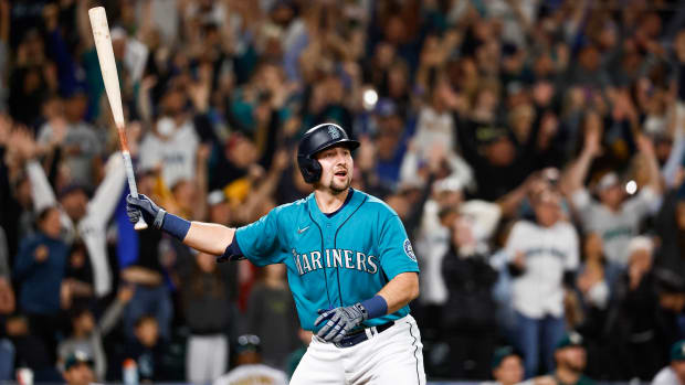 Mariners catcher Cal Raleigh reacts after hitting a walk-off solo-home run against the Oakland Athletics.